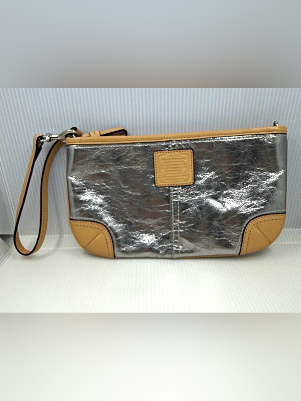 Coach Silver Metallic Wristlet with Tan Trim